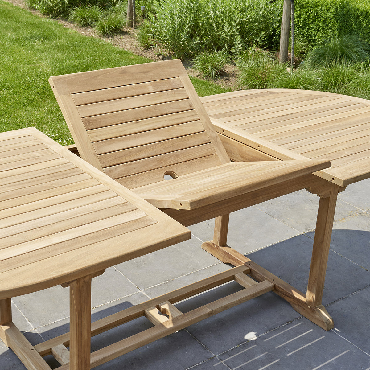21-table_de_jardin_en_teck_massif_extensible_ovale_8_10_pers-04.jpg
