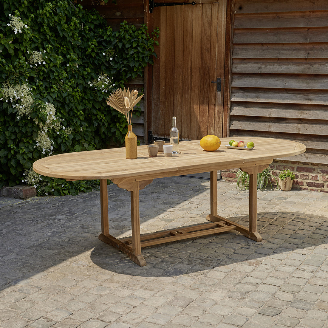 MIDLAND - Table de jardin en teck massif extensible ovale 8/10 pers.