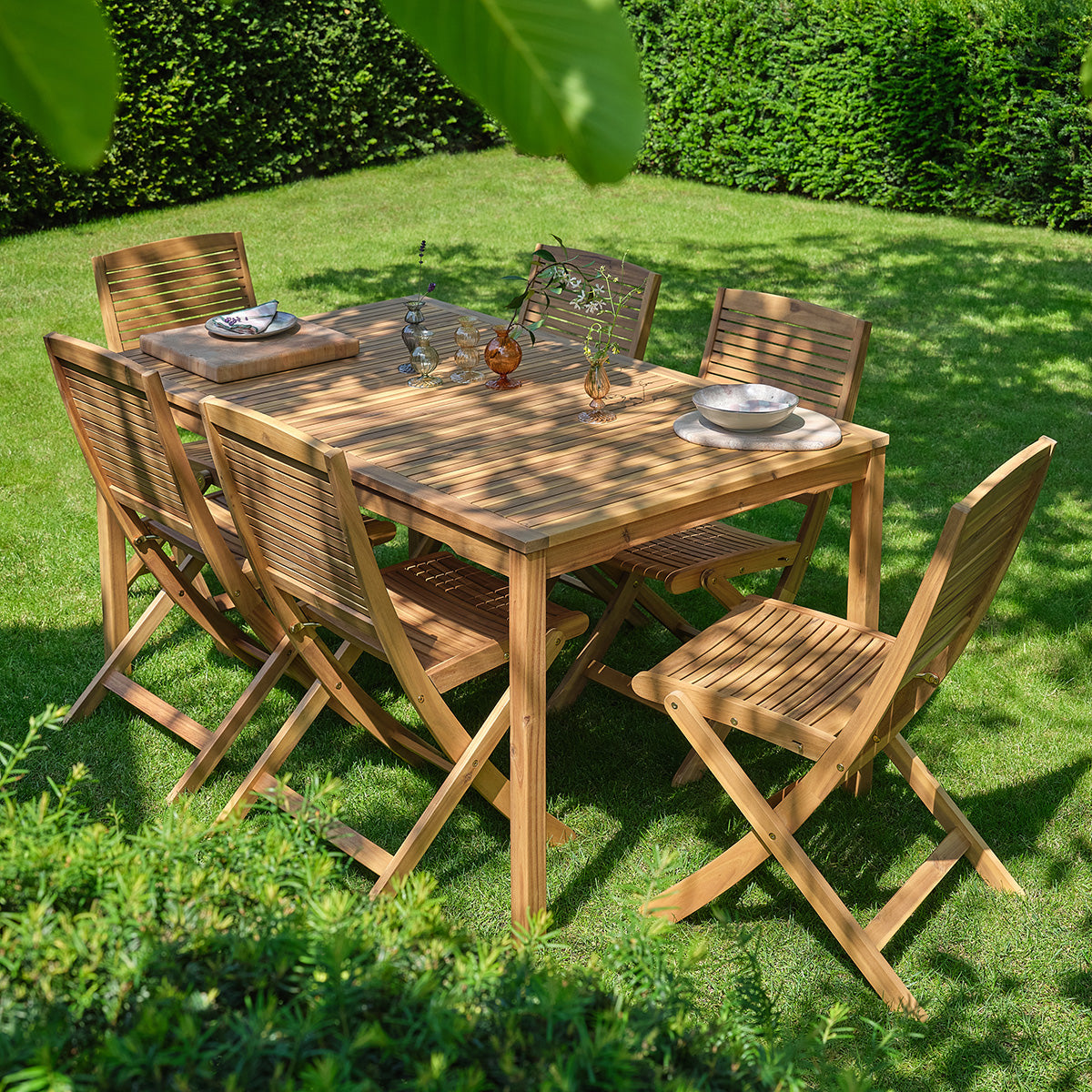 MILOS - Table de jardin en acacia massif huilé 150 cm